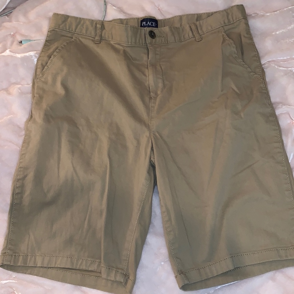 Place khaki shorts